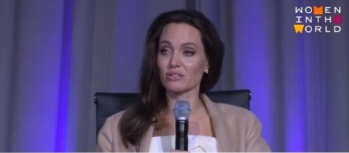 Angelina Jolie photographed at this year's TIFF - YouTube/Women In The World