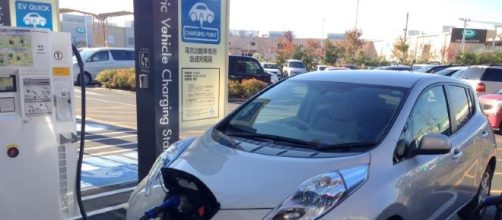 Electric car at EV charging point. - Image Credit: Creative Commons