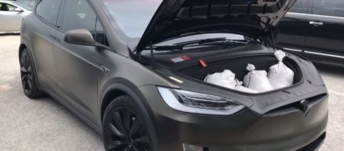 More power: Tesla puts a temporary battery upgrade on cars owned by Floridians escaping from Hurricane Irma. / from 'YouTube' screen grab