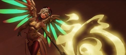 'Overwatch' hero Mercy. [Image via YouTube/AcidRockStar]