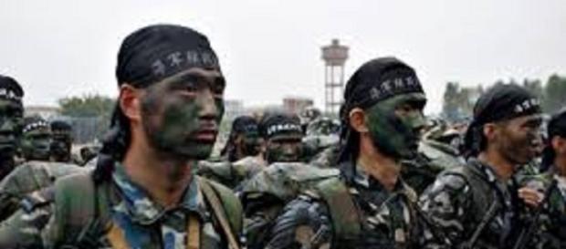 The Chinese army. https://upload.wikimedia.org/wikipedia/commons/3/37/Marines_of_the_People%27s_Liberation_Army_%28Navy%29.jpg The Chinese army. https://upload.wikimedia.org/wikipedia/commons/3/37/Marines_of_the_People%27s_Liberation_Army_%28Navy%29.jpg
