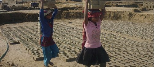 Children working as slaves credits:wikipedia https://en.wikipedia.org/wiki/Debt_bondage#/media/File:Child_Labour_in_Brick_Kilns_of_Nepal.jpg