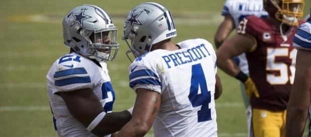 Dallas Cowboys' Dak Prescott and Ezekiel Elliott. Image Credit: Keith Allison, Flickr -- CC BY-SA 2.0 Dallas Cowboys' Dak Prescott and Ezekiel Elliott. Image Credit: Keith Allison, Flickr -- CC BY-SA 2.0