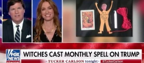 Tucker Carlson interviews the Oracle of Los Angeles about binding spell cast on Trump. Photo via YouTube channel Very Dicey.