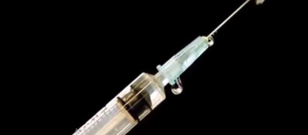 Syringe used for injecting drugs. (Image from Democracy Now!/Youtube) Syringe used for injecting drugs. (Image from Democracy Now!/Youtube)