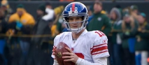 In his first two starts, Eli Manning completed 51 of 70 passes for 459 yards and a touchdown -- Mike Morbeck via WikiCommons