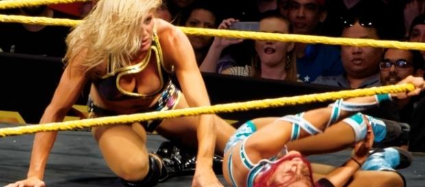 Charlotte and Sasha Banks involved in an offscreen feud - Miguel Discart via Wikimedia Commons Charlotte and Sasha Banks involved in an offscreen feud - Miguel Discart via Wikimedia Commons