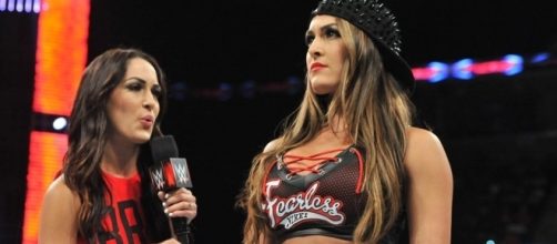 Brie and Nikki Bella want to make a WWE comeback in 2018 as "The Bella Twins." [Image via WWE/YouTube]