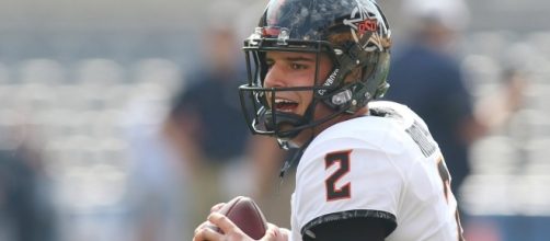 Quarterback Mason Rudolph and the Oklahoma State Cowboys host the TCU Horned Frogs on Saturday. [Image via ACC Digital Network/YouTube]