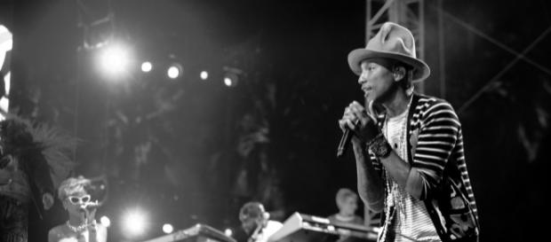 Pharrell Williams and other artists join #TakeAKnee movement in protest of Donald Trump. (Wikimedia/Shawn Ahmed) Pharrell Williams and other artists join #TakeAKnee movement in protest of Donald Trump. (Wikimedia/Shawn Ahmed)