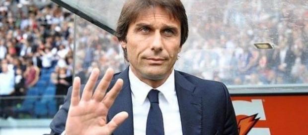 Antonio Conte waving to the camera (Nazionale Calcio via Flickr). Antonio Conte waving to the camera (Nazionale Calcio via Flickr).