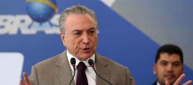 Em meio à nova denúncia, Temer discursa durante apresentação do plano "Progredir" Em meio à nova denúncia, Temer discursa durante apresentação do plano "Progredir"