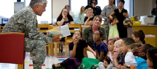 Chief of Staff of the Army Gen. George W. Casey read Dr. Seuss to children. (Image Credit: US Army / Wikimedia commons)