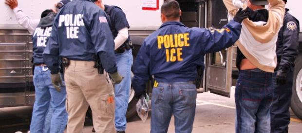 ICE authorities arrest suspected illegal immigrants in a raid. (Image Credit: U.S. Immigration and Customs Enforcement / Wikimedia) ICE authorities arrest suspected illegal immigrants in a raid. (Image Credit: U.S. Immigration and Customs Enforcement / Wikimedia)