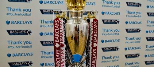 The Barclays Premier League trophy with the Manchester United ribbons on it. PHOTO/ Flickr