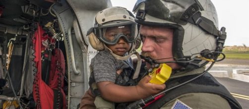 Evacuation of Puerto Rican Refugee Child (Image courtesy of Defense Department)