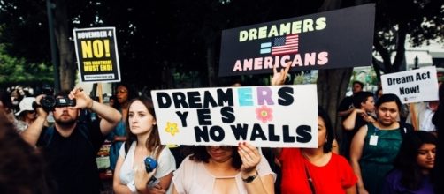Immigration advocates for DREAMers. [Image via Flickr/Molly Adams]