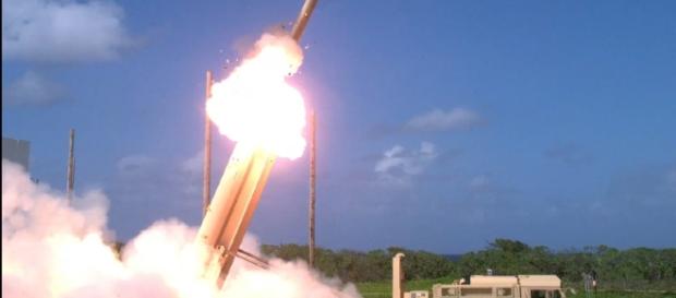 THAAD missile defense system. https://upload.wikimedia.org/wikipedia/commons/f/fe/THAAD_missile_launch_on_Wake_Island.jpg THAAD missile defense system. https://upload.wikimedia.org/wikipedia/commons/f/fe/THAAD_missile_launch_on_Wake_Island.jpg