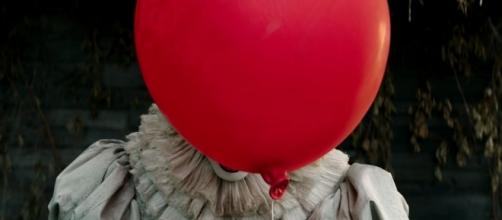 A teenager confessed to placing red balloons around town, leading to police's viral Facebook post [Image: YouTube/Warner Bros. Pictures]