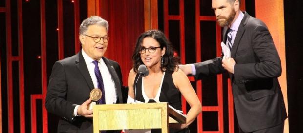 Al Franken presents a Peabody award to Julia Louis-Dreyfus and Timothy Simons from VEEP. Photo: Peabody Awards/Creative Commons Al Franken presents a Peabody award to Julia Louis-Dreyfus and Timothy Simons from VEEP. Photo: Peabody Awards/Creative Commons