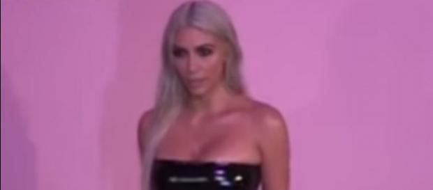 Kim Kardashian West flashes her silvery blonde hair at the Tom Ford show.-You Tube/ Storm Shadow Crew Kim Kardashian West flashes her silvery blonde hair at the Tom Ford show.-You Tube/ Storm Shadow Crew