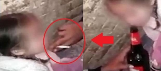 Menina é obrigada a fumar maconha (Foto: Captura de vídeo) Menina é obrigada a fumar maconha (Foto: Captura de vídeo)