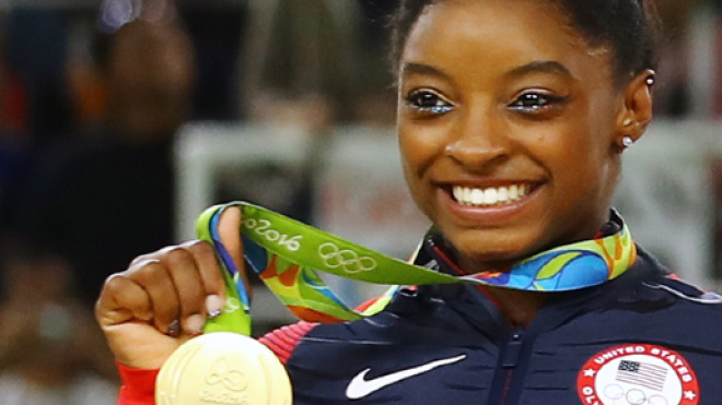 Gymnast Simone Biles brings prayer to Rio and takes home gold ... - religionnews.com
