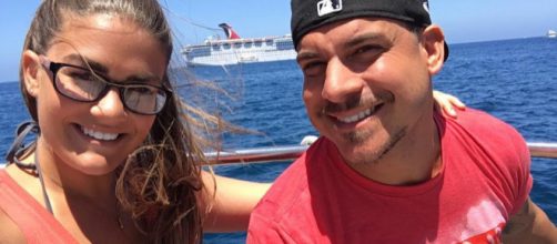 Brittany Cartwright and Jax Taylor pose on the water. [Photo via Instagram]