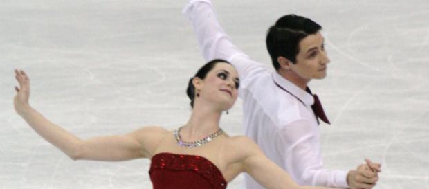 Virtue and Moir will carry the Canadian flag in the 2018 winter Olympics/ Photo via: Wikimedia Commons Virtue and Moir will carry the Canadian flag in the 2018 winter Olympics/ Photo via: Wikimedia Commons