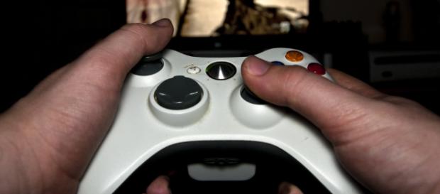 Person playing video games -- Luke Hayfield/Flickr. Person playing video games -- Luke Hayfield/Flickr.