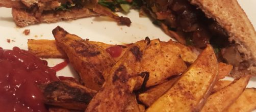 Jackfruit barbecue sandwich with a side of sweet potato fries. Picture taken by author.