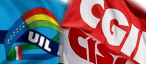 Sindacati uniti con le loro bandiere