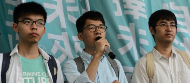 Joshua Wong, Nathan Law y Alex Chow, miembros del movimiento Umbrella. Joshua Wong, Nathan Law y Alex Chow, miembros del movimiento Umbrella.