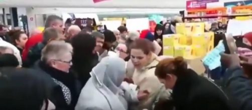 French shoppers fight over Nutella. [Image via Manny the kid Perez/YouTube screencap.)