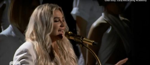 Kesha was among the ladies in white who were emblems of strength and unity at the 2018 Grammy Awards. Image cap Entertainment Tonight/YouTube