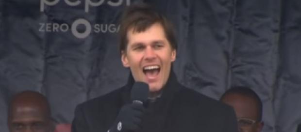 Tom Brady addresses the crowd during the Patriots’ send-off rally (Image Credit: CBS Boston/YouTube) Tom Brady addresses the crowd during the Patriots’ send-off rally (Image Credit: CBS Boston/YouTube)