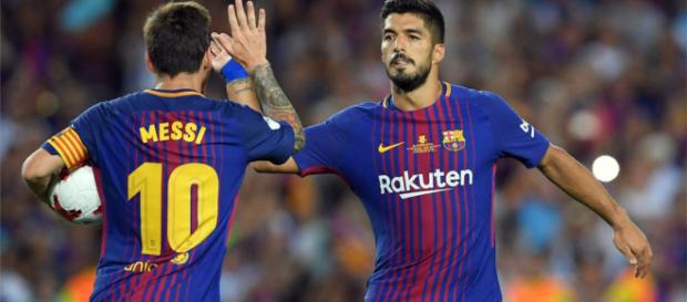 Luis Suárez y Messi celebrando un gol Luis Suárez y Messi celebrando un gol