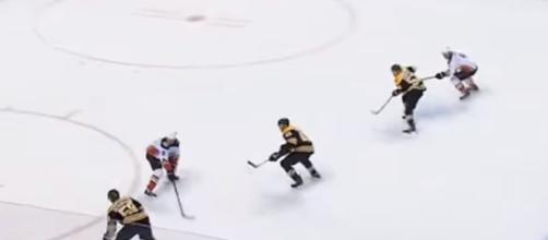 The Bruins are flying high thanks to an influx of talented youth [Image via NHL / YouTube Screencap]