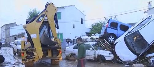 An area of Mallorca in the Balearic Islands suffered flash flooding killing at least 9 people. [Image Guardian News/YouTube]