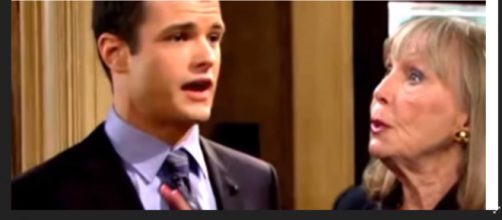 Dina leads Kyle to a secret wall safe in the Abbot mansion. (Image Source: The Young and the Restless Spoilers and recaps-YouTube.)