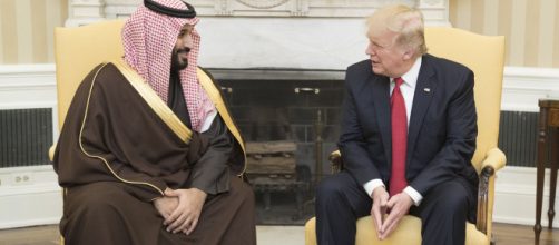 President Donald Trump speaks with Mohammed bin Salman bin Abdulaziz Al Saud. [Image source: Shealah Craighead | Wikimedia Commons]