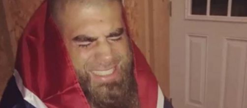 David Eason angers Instagram followers by wrapping himself in the Confederate Flag. [Image Source: Usa & News - YouTube]
