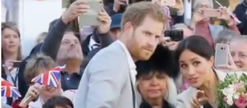 Prince Harry and Meghan Markle in a crowd [Image courtesy – TV News 24h YouTube video]