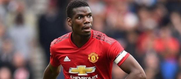 Paul Pogba traverse une période difficile à Manchester, mais ne bougera pas selon Raiola Paul Pogba traverse une période difficile à Manchester, mais ne bougera pas selon Raiola