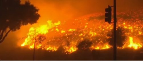 California Sees Most Destructive Wildfire in History. [Image source/RT America YouTube video]