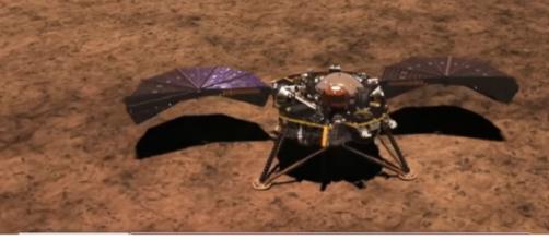 NASA's Insight lander touches down on Mars. [Image source/CBS Evening News YouTube video]