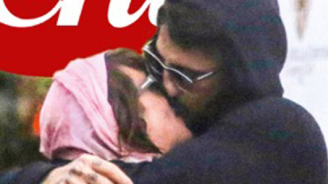 Fabrizio Corona e Asia Argento in un bacio appassionato