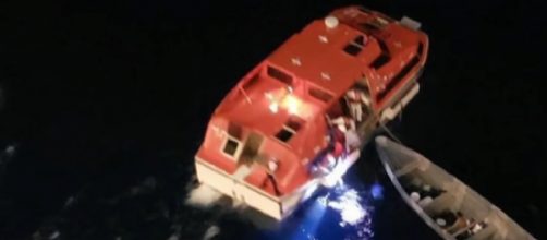 Cruise ship rescues fishermen stranded at sea for 20 days. [Image source/CBS News YouTube video]