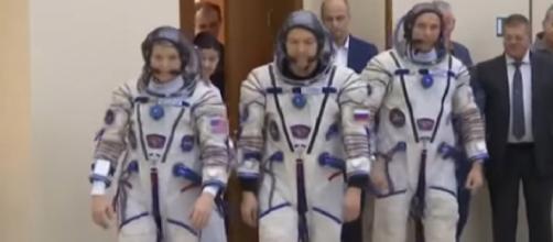 ISS crew ready for planned launch on December 3. [Image source/AP Archive YouTube video]