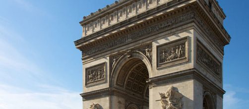 Arc de Triomphe was defaced with graffiti in the P aris riots. [Image Source: Arc de Triomphe 21 October 2010 Flickr photographer Jiuguang Wang]